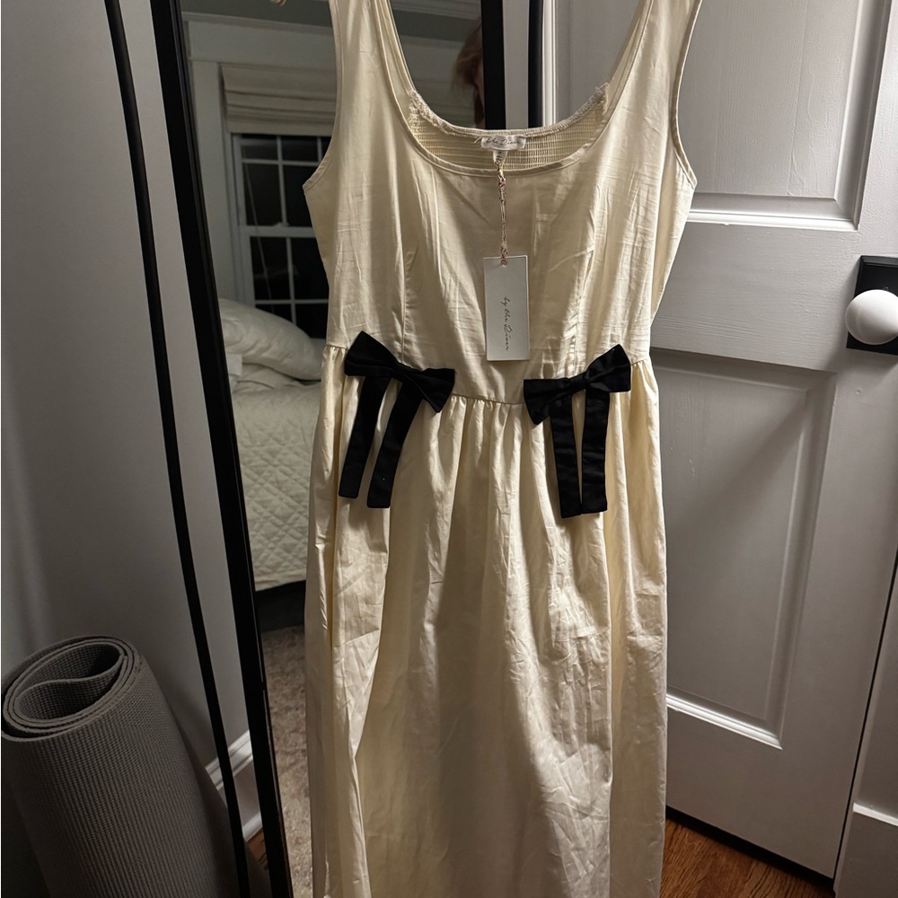 Sleeveless Cream Midi Dress with Black Bow Details